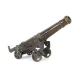 An 18th/19th Century Bronze Signalling Cannon, the 32cm ringed barrel with ogee muzzle, capstan type