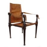 An Early 20th Century ''Roorkhee'' Campaign Chair, the turned oak frame with conical terminals to