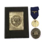 A German Third Reich Award for Outstanding Care and Keeping of Horses, in the form of a white