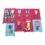 A US Distinguished Service Cross, un-numbered, with ribbon; Thailand - a Freemen Safeguarding Medal,