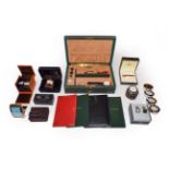 Four Smythson items including a sterling-mounted jotter, two Links alarm clocks in leather cases,