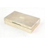 A George VI Silver Cigarette-Box, by Harman Brothers, Birmingham, 1951, oblong, the hinged cover