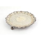 A George IV Silver Salver, by John Wakefield, London, 1824, shaped circular and on three leaf-capped