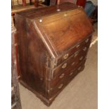 A George III oak bureau, 93cm by 50cm by 98cm