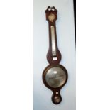 A 19th century mahogany wheel barometer with silvered dials, signed Mangarballum, Leicester 97cm .