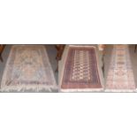 A Narrow Ardabil runner, the field with a column of medallions framed by narrow borders, 275cm by