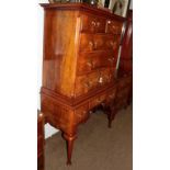 Early 20th century figured walnut chest on stand, 102cm by 50cm by 166cm