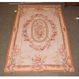 Aubusson style needlepoint rug, the field with oval floral medallion framed by floral borders, 185cm