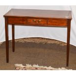 A Georgian mahogany single-drawer side table, raised on reeded square tapering supports, 90cm by