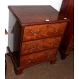 A George III figured mahogany three-height chest of small proportions with oak drawer lining and