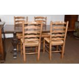 An early 20th century oak refectory dining table, 182cm by 81cm by 74cm raised on carved bulbous