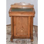 A Victorian walnut davenport of small proportions with leather top marquerty inlay, 53cm by 44cm