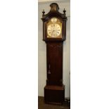 An oak eight-day longcase clock, 13'' arched brass dial with silvered chapter ring, the arch with