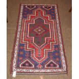 A West Anatolian village rug, the field with stepped medallion enclosed by narrow borders, 163cm
