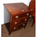 A George III mahogany three-height chest of small proportions with strung inlay and raised on