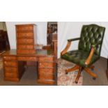 A mahogany twin-pedestal leather topped desk, 138cm by 77cm by 76cm together with a matching