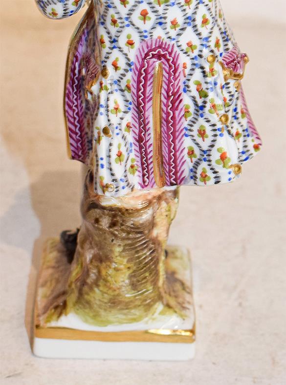 A tray of Continental porcelain figures including a Meissen style figure of a seated shepherd and - Image 11 of 32