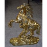 A large brass Marley horse, 46cm by 60cm