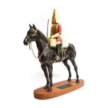 Beswick Connoisseur Lifeguard, (Style two: with sword), model No. 2562, black matt, on wooden