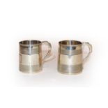 Two George III silver mugs, one possibly by Elizabeth Morley, London, 1813, the other marks worn,