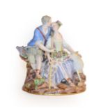 A Meissen porcelain figure group, circa 1880, as a 18th century lovers sitting on a rocky outcrop,