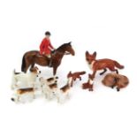 Beswick Hunting Group Comprising; Huntsman (Style Two: Standing), model No. 1501, a large fox, three