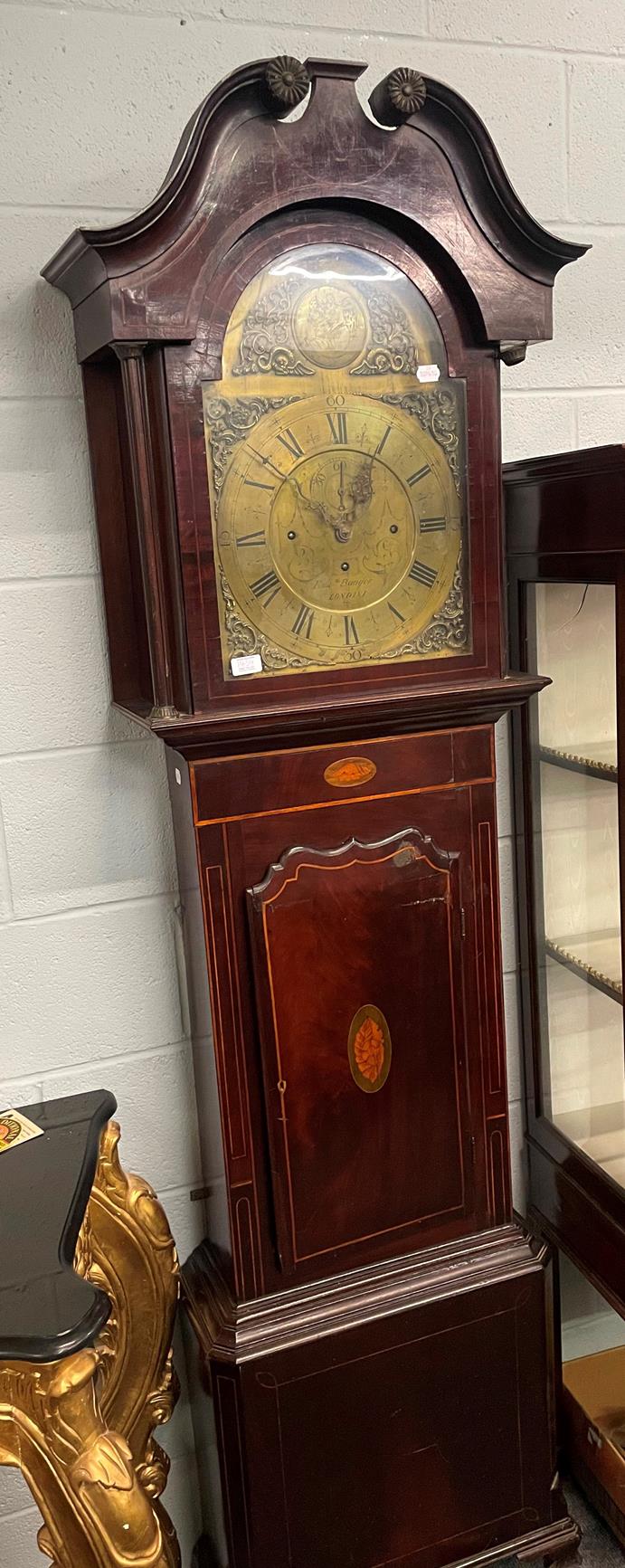 A mahogany inlaid quarter chiming longcase clock, 14'' arched brass dial bearing a later inscription