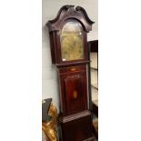 A mahogany inlaid quarter chiming longcase clock, 14'' arched brass dial bearing a later inscription