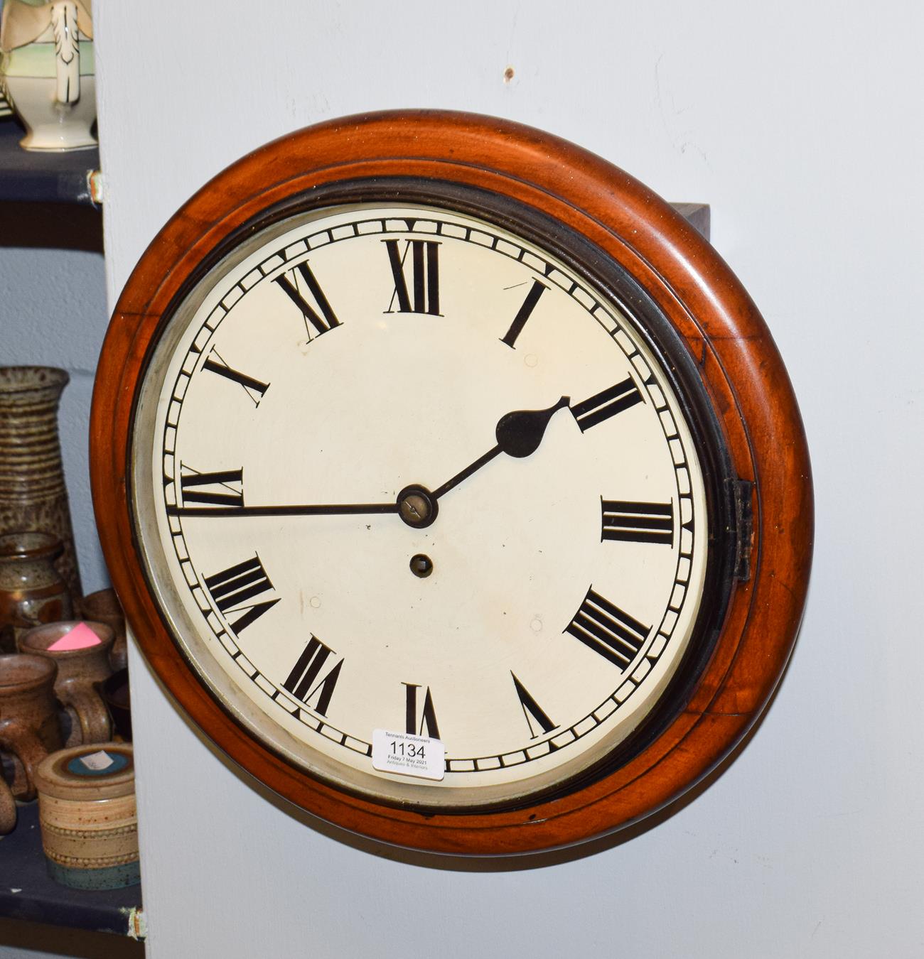 A mahogany single fusee wall clock