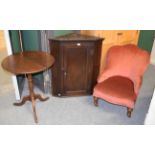 An 18th century oak hanging corner cupboard, Victorian nursing chair and a mahogany tripod table (
