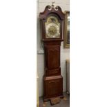 A George III oak and mahogany eight-day longcase clock with brass arch top dial, silvered chapter