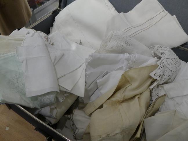 Quantity of assorted white linen, embroidered textiles, handkerchiefs, table linens in a navy - Image 4 of 12