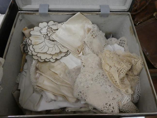 Quantity of assorted white linen, embroidered textiles, handkerchiefs, table linens in a navy - Image 11 of 12