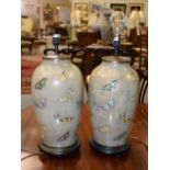 A pair of modern Chinese table lamps decorated with butterflies, 47cm