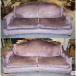 A pair of large curved purple upholstered four seater sofas, length 240cm