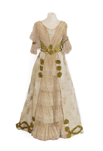 A 19th Century Wedding Costume, comprising a fitted bodice in a silk brocade woven with lily of