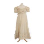 A 19th Century Cream Silk Short Sleeve Dress woven with leaves, military style cream silk