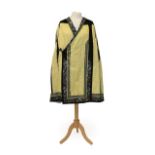 Early 20th Century Chinese Yellow Silk Brocade Cape with black silk shoulders, applied,