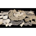 Late 19th and Early 20th Century Lace, comprising a bertha of tape lace applied floral lace; another
