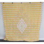 A Late 19th Century Decorative Signature Quilt, comprising yellow and white cotton diamond shaped