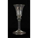 A Wine Glass, circa 1740, the bell shaped bowl over a ball knop and plain stem on folded foot, 15.