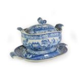 A Pearlware Soup Tureen, Cover and Stand, circa 1830, with recumbent lion knop and scroll handles,