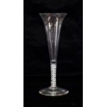 A Wine Flute, circa 1770, the slender funnel with slightly everted rim on an opaque twist stem, 19.