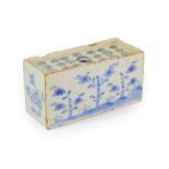 An English Delft Flower Brick, circa 1750, of rectangular form,