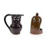 A Black Glazed Puzzle Jug, 19th century,