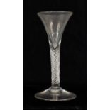 A Wine Glass, circa 1750, the drawn trumpet bowl on an air twist stem and plain foot, 17.