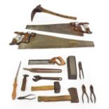 Various Woodworking Tools including an adze, two Disston saws longest 26'', Tenon saw and others