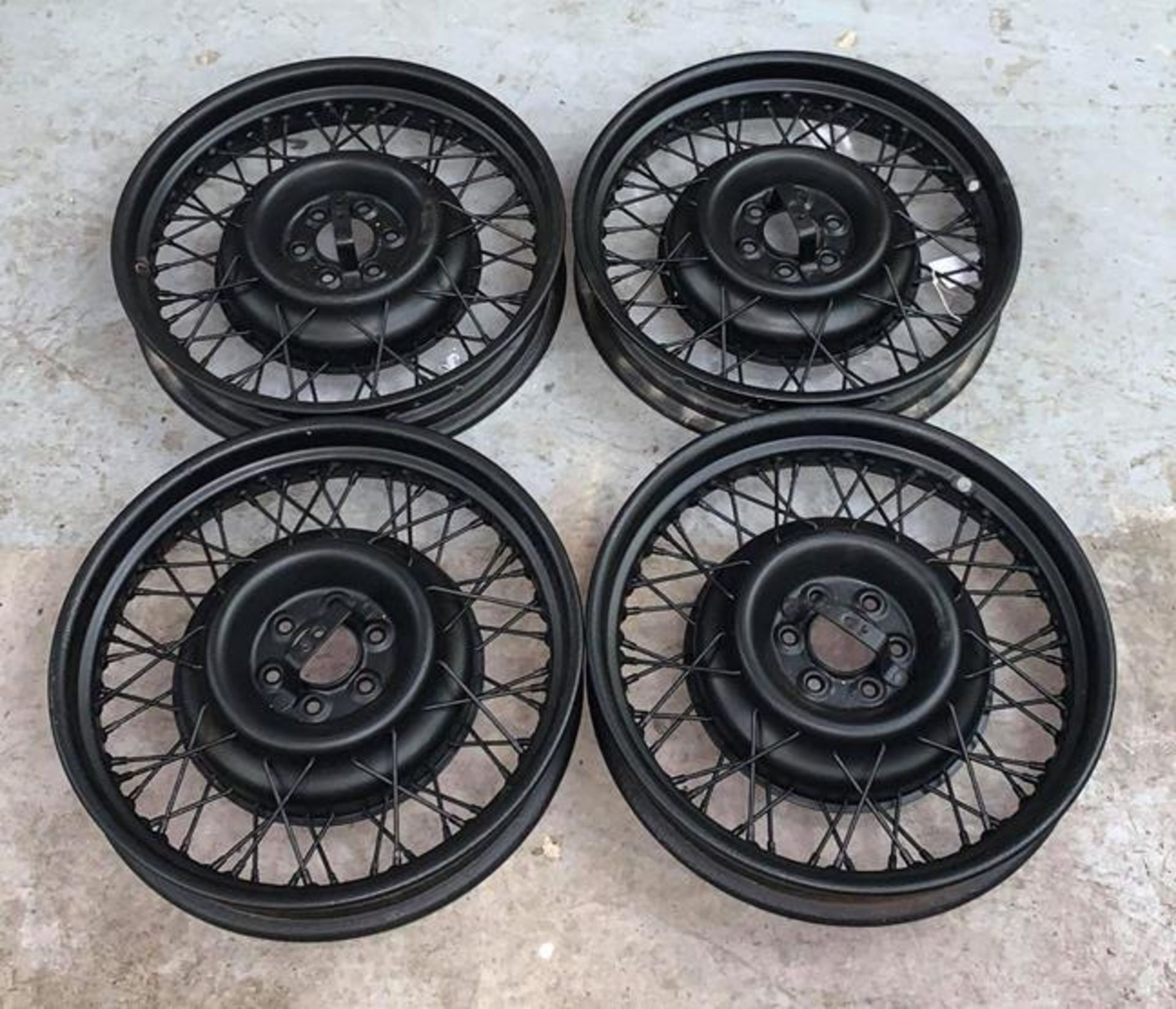 ~ Four Pre-War 19'' Wire Wheels, sand-blasted and repainted black
