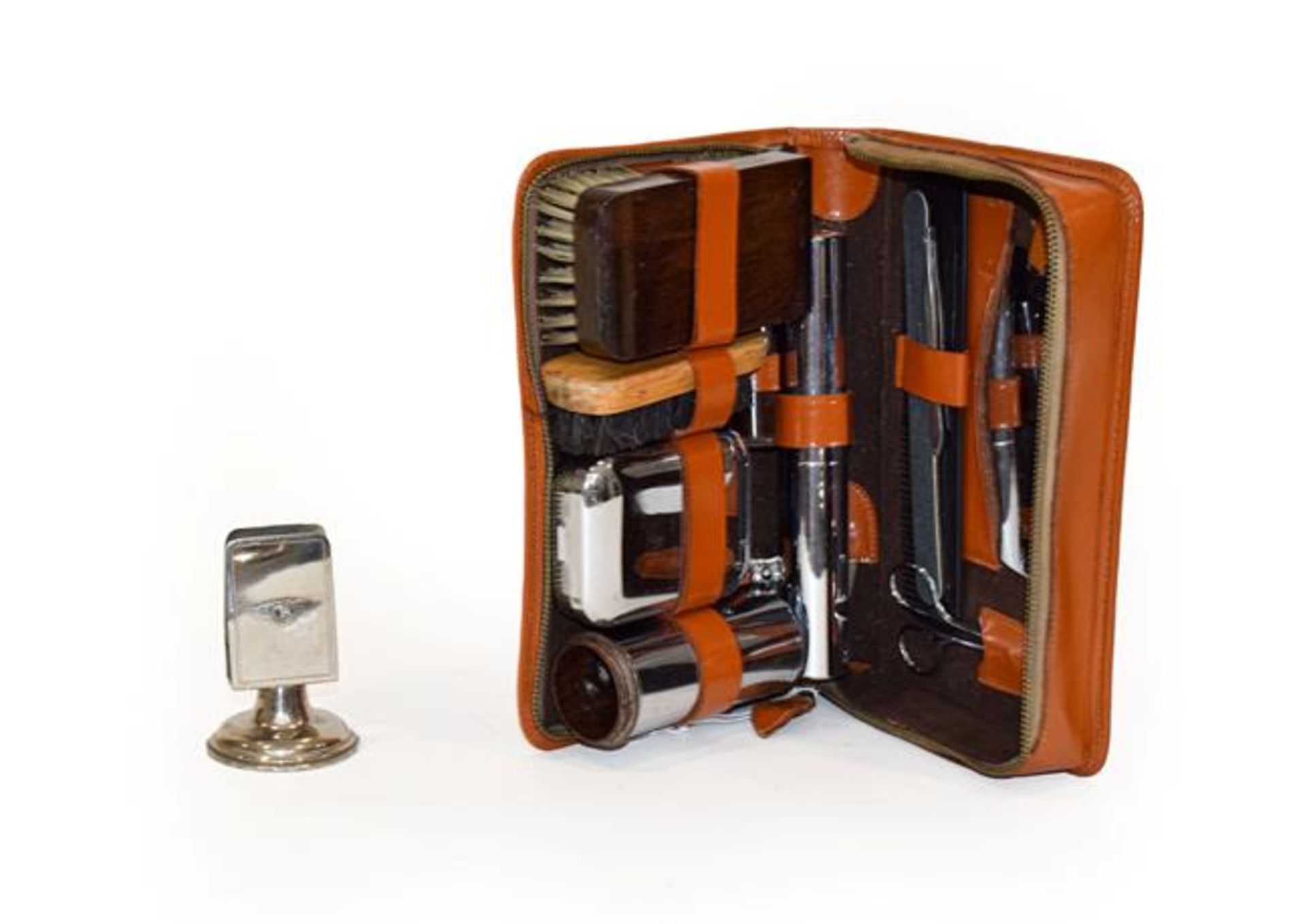 Bentley Interest: A Circa 1940/50 Brown Leather Motorist's Travelling Grooming Set, with zip opening