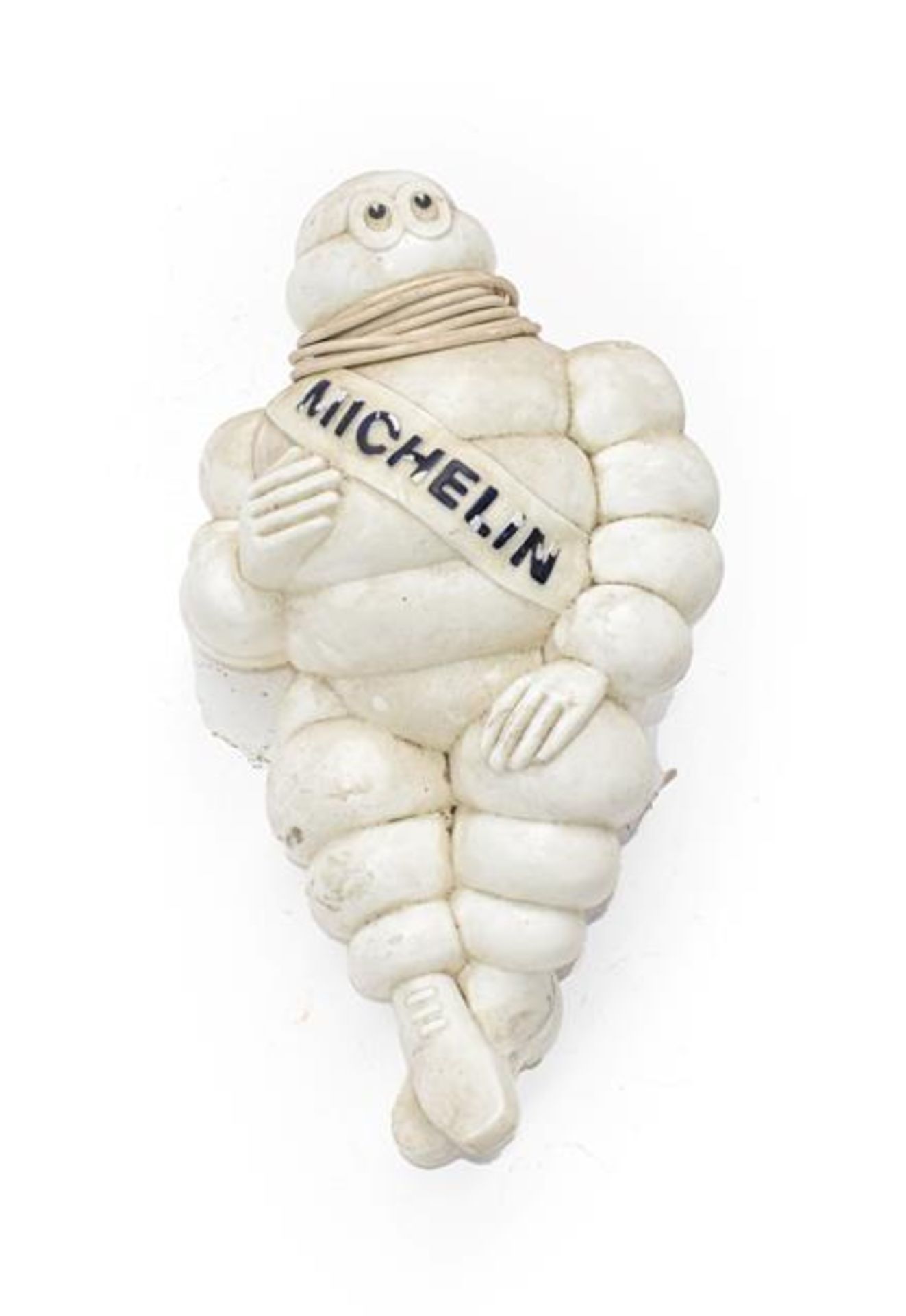 An Illuminated Michelin Man Advertising Figure, seated on a metal mounted bracket fitted with two-